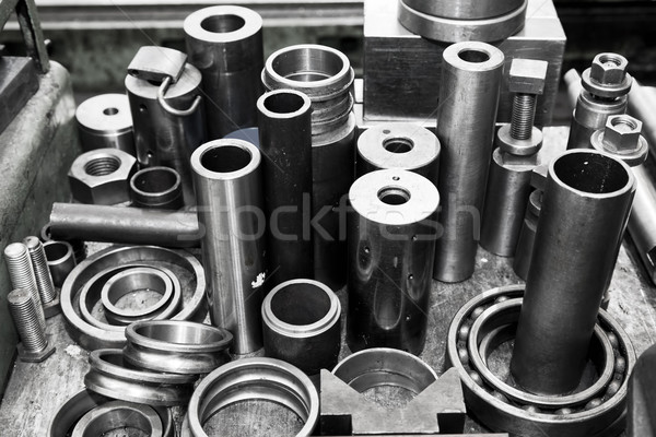 Steel cylinders, pistons and tools in workshop. Industry theme. Stock photo © photocreo