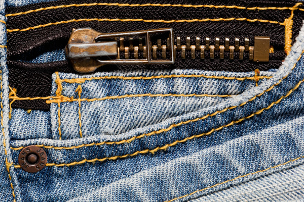 Blue jeans close up on a pocket and a zipper.  Stock photo © photocreo