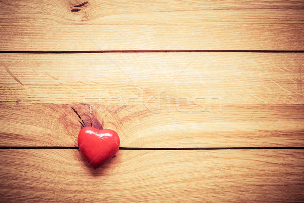 Stock photo: Red little heart on wood. Vintage concept of love, Valentine's Day