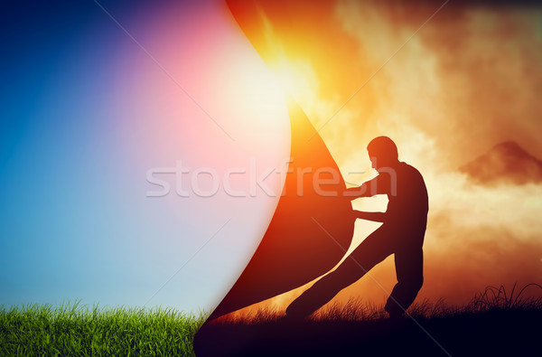 Man pulling curtain of darkness to reveal a new better world. Change. Stock photo © photocreo