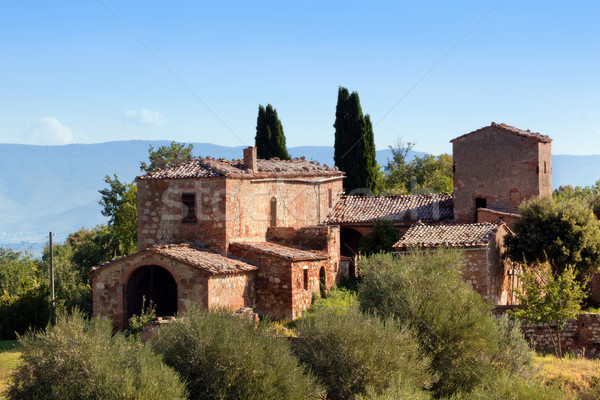 A residence in Tuscany, Italy. Tuscan farm house, cypress trees Stock photo © photocreo