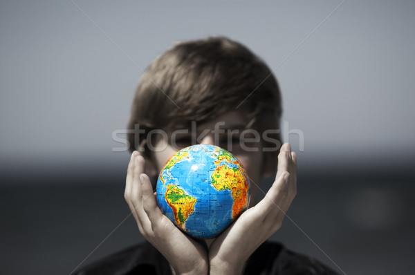 Earth globe in hands. Conceptual image Stock photo © photocreo