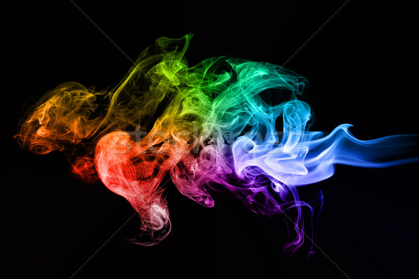 Colorful creative smoke waves on black background Stock photo © photocreo