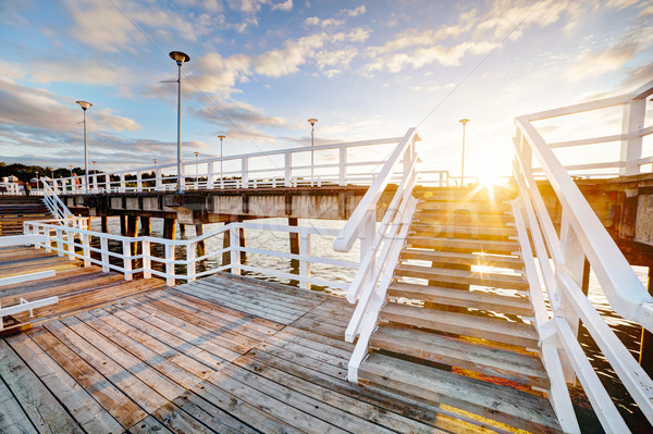 Beautiful retro pier at sunset. Gdansk Brzezno, Poland Stock photo © photocreo