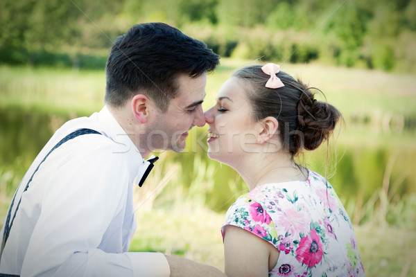 Young couple in love looking at each other. Summer park Stock photo © photocreo