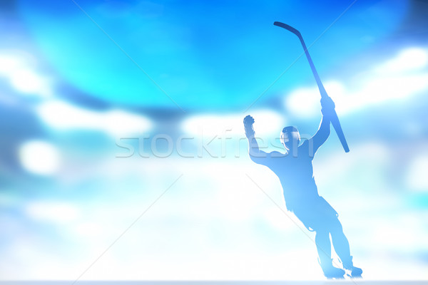 Hockey player celebrating goal, victory with hands and stick up Stock photo © photocreo