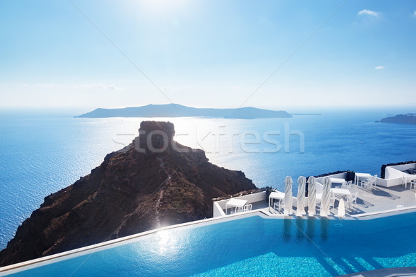 Swimming pool with a view on Caldera over Aegean sea, Santorini, Greece Stock photo © photocreo