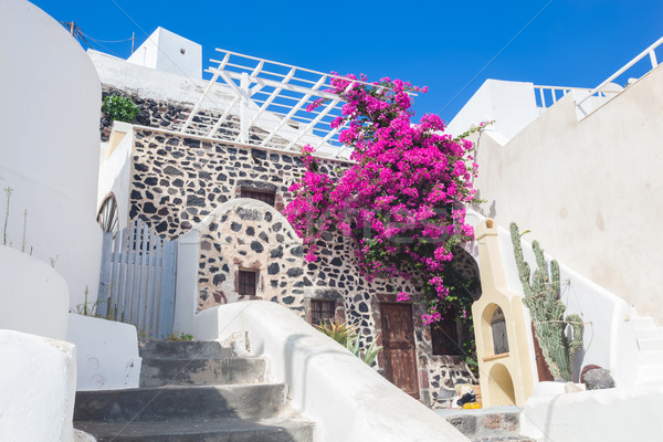 Traditional Greek whitewashed stone house, Santorini island, Greece. Stock photo © photocreo