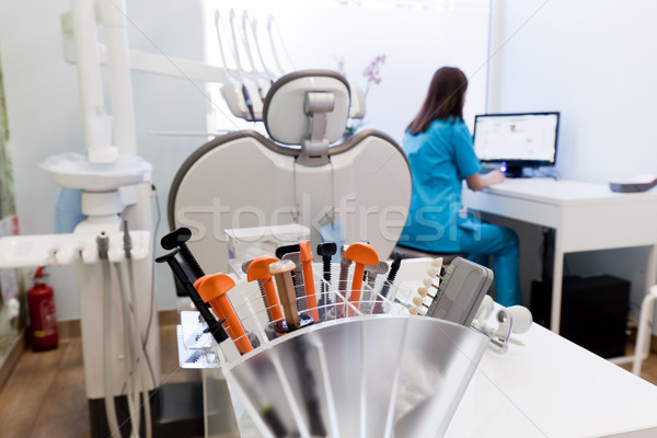 Equipment and dental instruments in dentist's office. Dentist at work Stock photo © photocreo