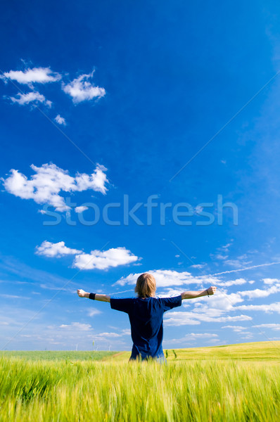 Stock photo: Happy man with arms up