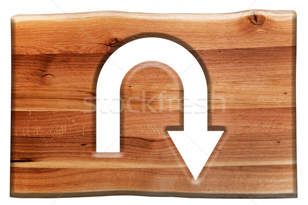 U-turn sign cut in wooden board isolated on white Stock photo © photocreo