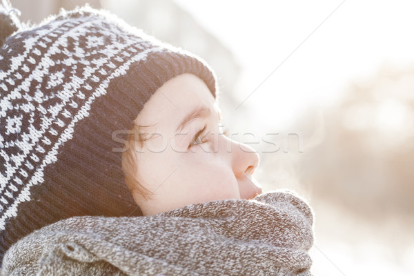 Little boy looking up the sky in winter Stock photo © photocreo