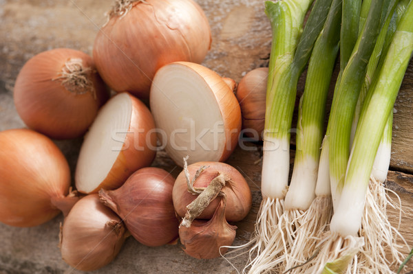 Fresh brown onions with scallions Stock photo © photohome