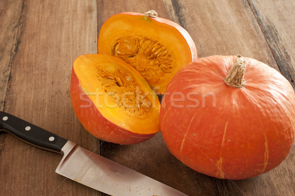 Small round oddly shaped pumpkin cut in middle Stock photo © photohome