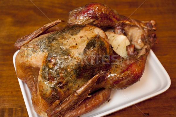 Delicious grilled or roast chicken on a plate Stock photo © photohome