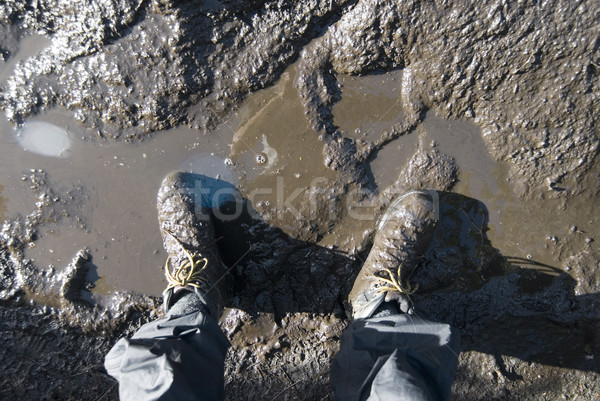 Modderig laarzen naar beneden te kijken paar lopen Stockfoto © photohome