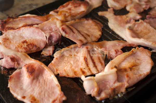 Cooking rashers of bacon for breakfast Stock photo © photohome