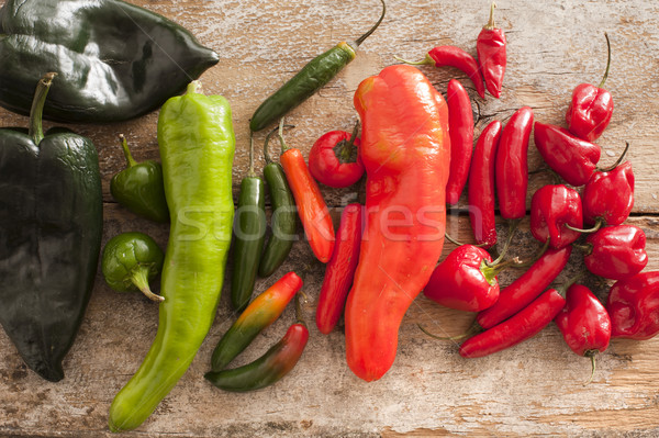 Colorful selection of spicy peppers on table Stock photo © photohome