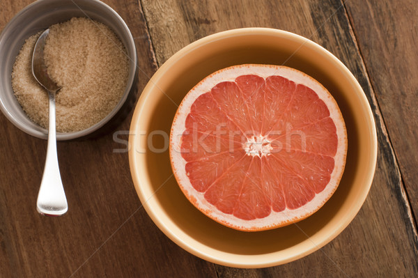Fresh halved pink grapefruit served with sugar Stock photo © photohome