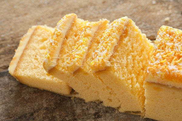 Stock photo: Close up of yellow cake with sprinkles and icing