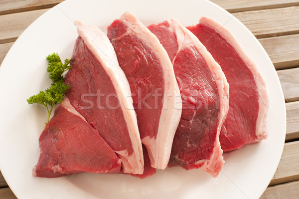 Cztery świeże surowy wołowiny tablicy tłuszczowy Zdjęcia stock © photohome
