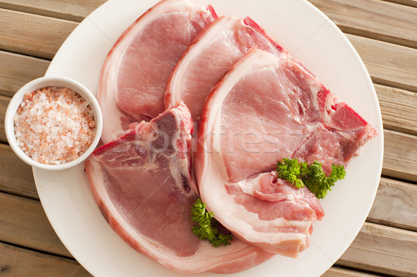 Raw pork cutlets with their rind Stock photo © photohome