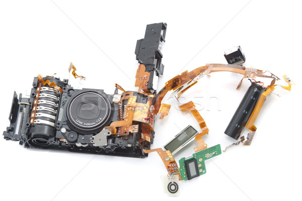 Disassembled digital camera with exposed lens Stock photo © photohome