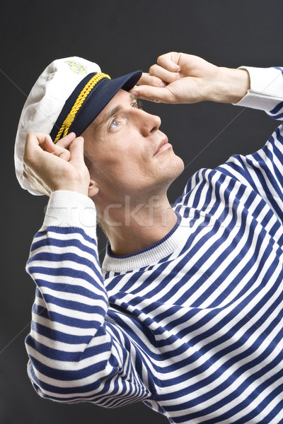 Stock photo: Young sailor man with white sailor hat