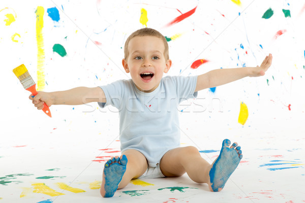 Adorable 3 year old boy child creatively stains on the wall. Stock photo © Photoline