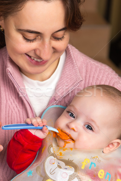 Stock photo: Baby first time eating alone