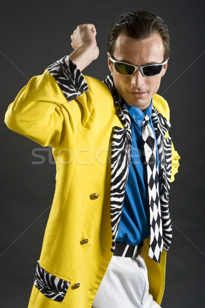rockabilly singer from 1950s in yellow jacket Stock photo © Photoline