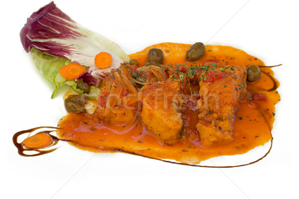 Cod in Sicilian Olive Sauce. . Typical dish from Messina. Sicily Stock photo © Photooiasson