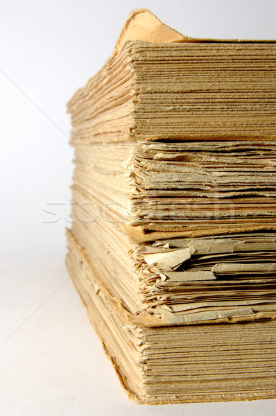 Antique books piled front a silver background Stock photo © Photooiasson