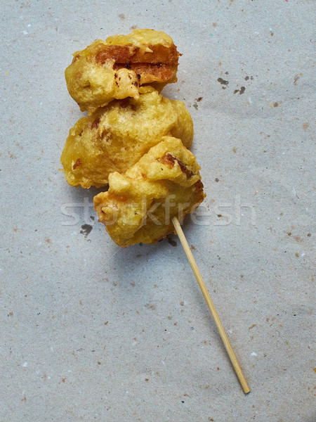 Mozzarella in carrozza on a rustic paper. Stock photo © Photooiasson