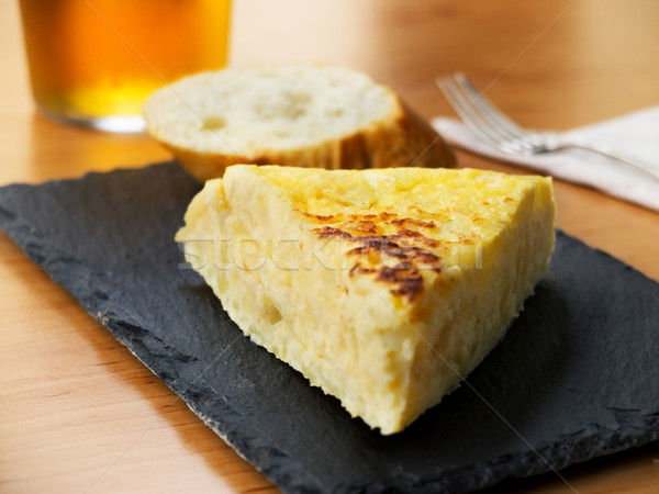 Typical spanish pincho de tortilla de patatas Stock photo © Photooiasson