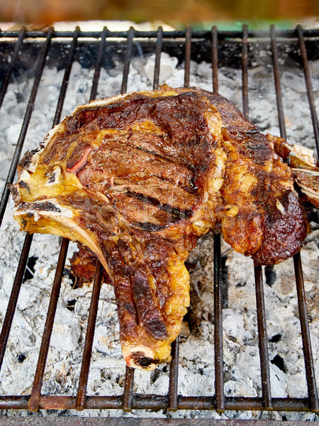 Hiszpanski wołowiny węgiel drzewny BBQ stek cowboy Zdjęcia stock © Photooiasson