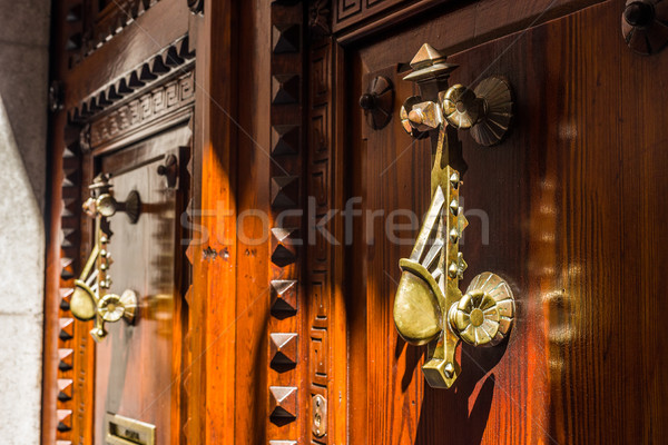Antik fából készült ajtó európai utca textúra Stock fotó © Photooiasson