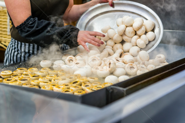 Cooking mushrooms in a kitchen. Stock photo © Photooiasson