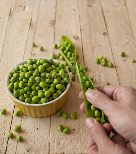 Stock photo: Ecological fresh green peas pods.