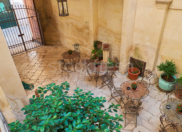 Terrace in a courtyard of a baroque palace of southern Italy. Stock photo © Photooiasson