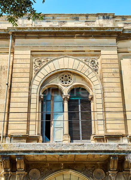 Window of a baroque palace in Lecce, Apulia. Stock photo © Photooiasson