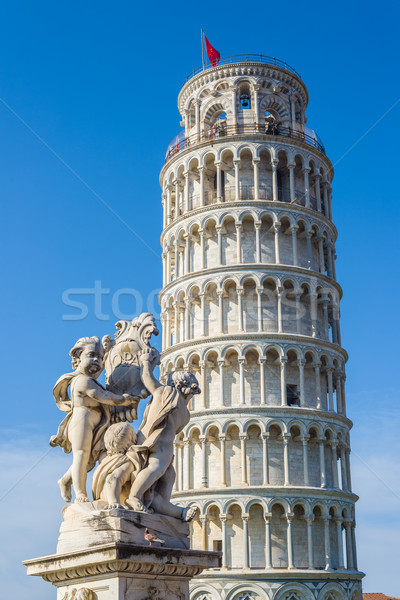 Fontana dei Putti with leaning tower in background. Pisa, Italy Stock photo © Photooiasson