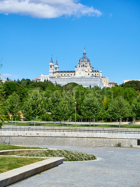 Green spaces of Madrid Rio with the Almudena Cathedral in background. Stock photo © Photooiasson