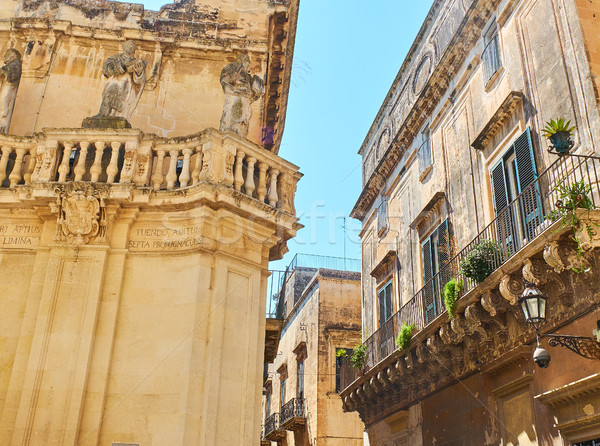 Balcony of a baroque palace in Lecce, Puglia. Stock photo © Photooiasson