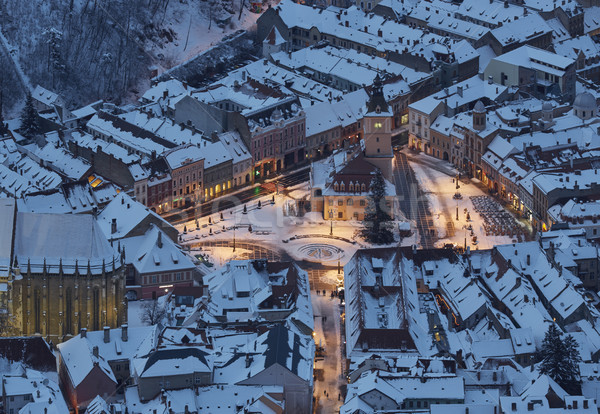 Stock photo: Aerial twilight cityscape of snowy Council Square, Brasov, Roman