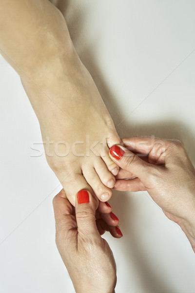 Foot massage in spa salon Stock photo © photosebia