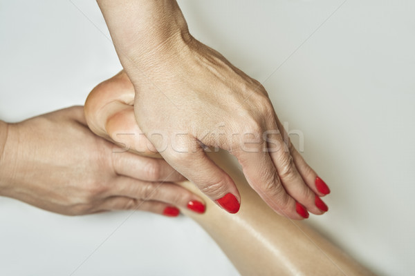 Foot massage in spa salon Stock photo © photosebia