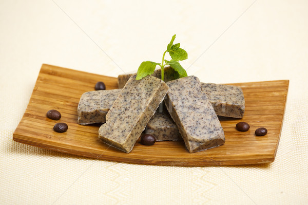 Stock photo: Handmade soap bars on wooden stand