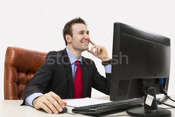 Handsome businessman smiling positively Stock photo © photosebia