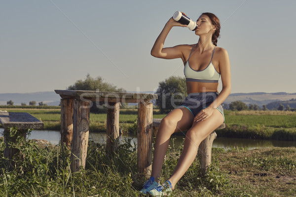 Woman hydrating after run Stock photo © photosebia